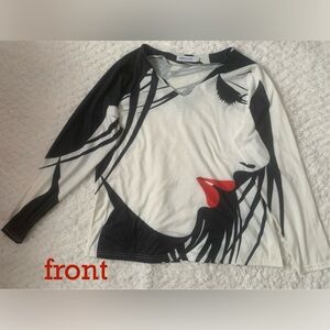 Long sleeve shirt, black and white all around with only red lips standing out.